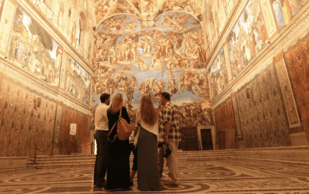 A family alone in the Sistine Chapel.